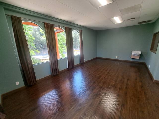 Unit 204 — upper-level medical suite (~2,717 SF), arched windows